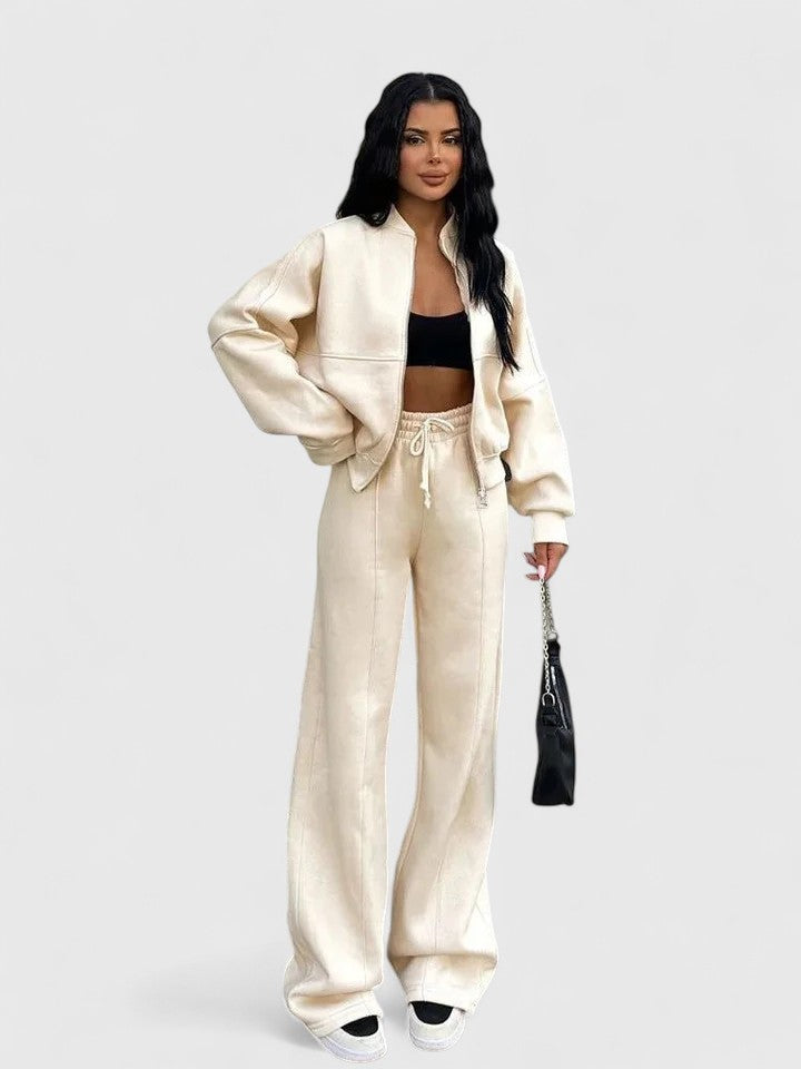 Zip-up sweater and drawstring pants set in cream, long sleeves with drawstring waist.