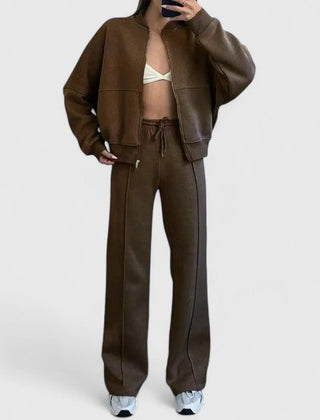 Zip-up sweater and drawstring pants set in brown with relaxed fit and adjustable waistband.