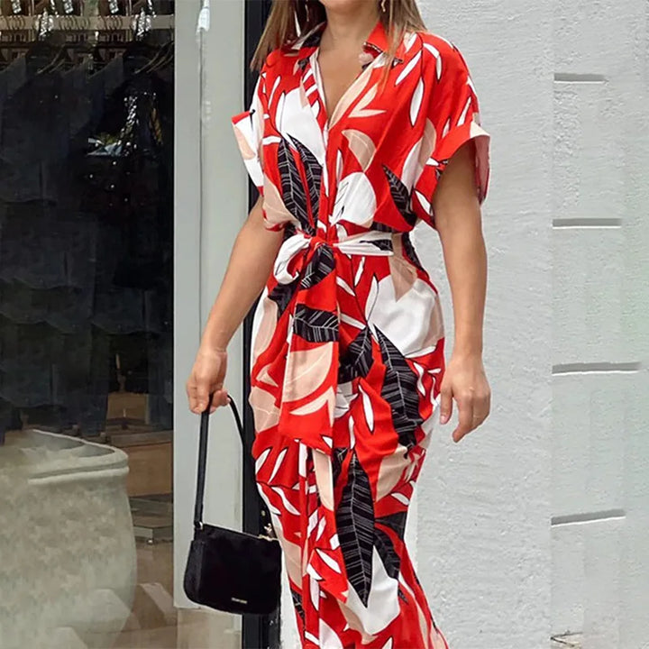 Red and white graphic wrap maxi dress with short sleeves and tie waist