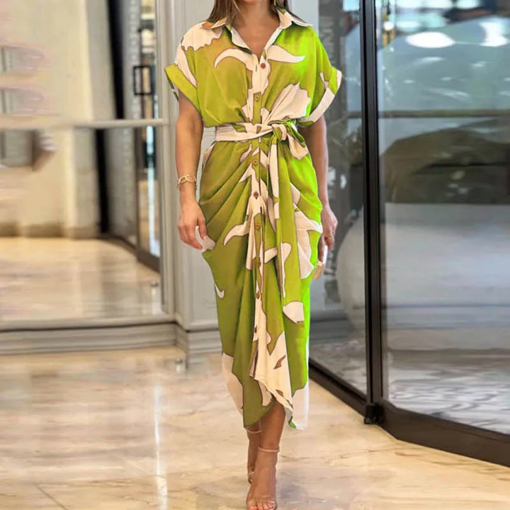 Lime green wrap maxi dress with cream leaf pattern, short sleeves and tie waist