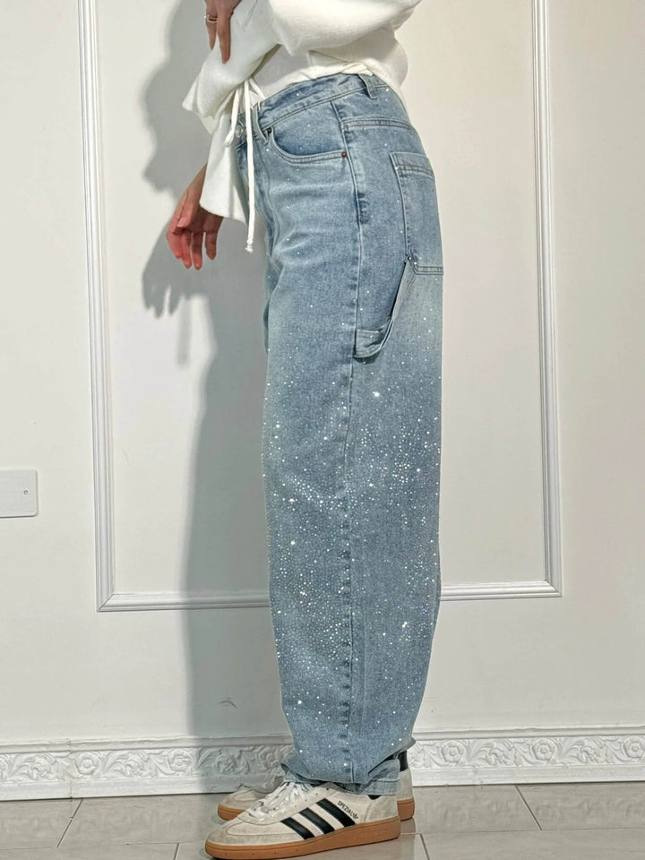 Light blue speckled denim trousers, relaxed wide-leg cut with belt loops and pockets
