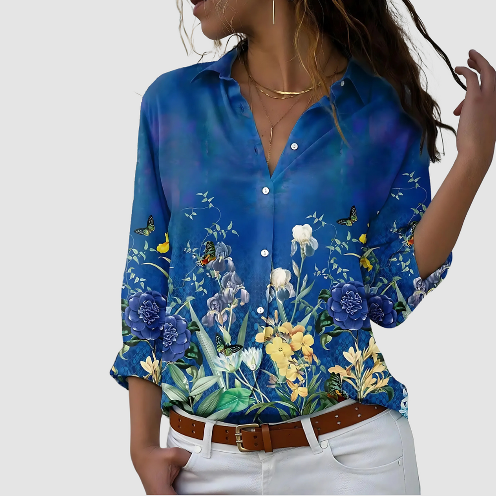 Blue floral button-up blouse with short sleeves