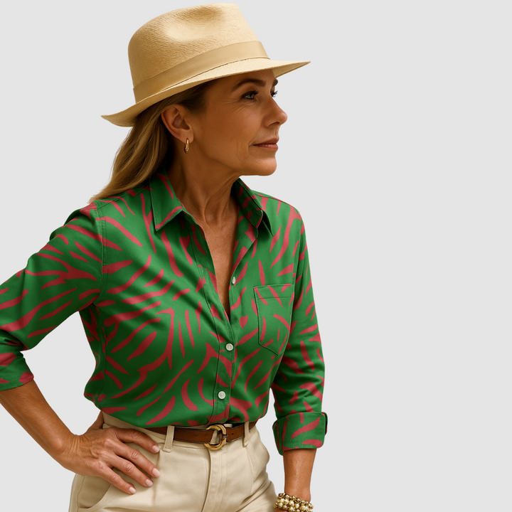 Moss green button-up blouse with red leaf print and long sleeves