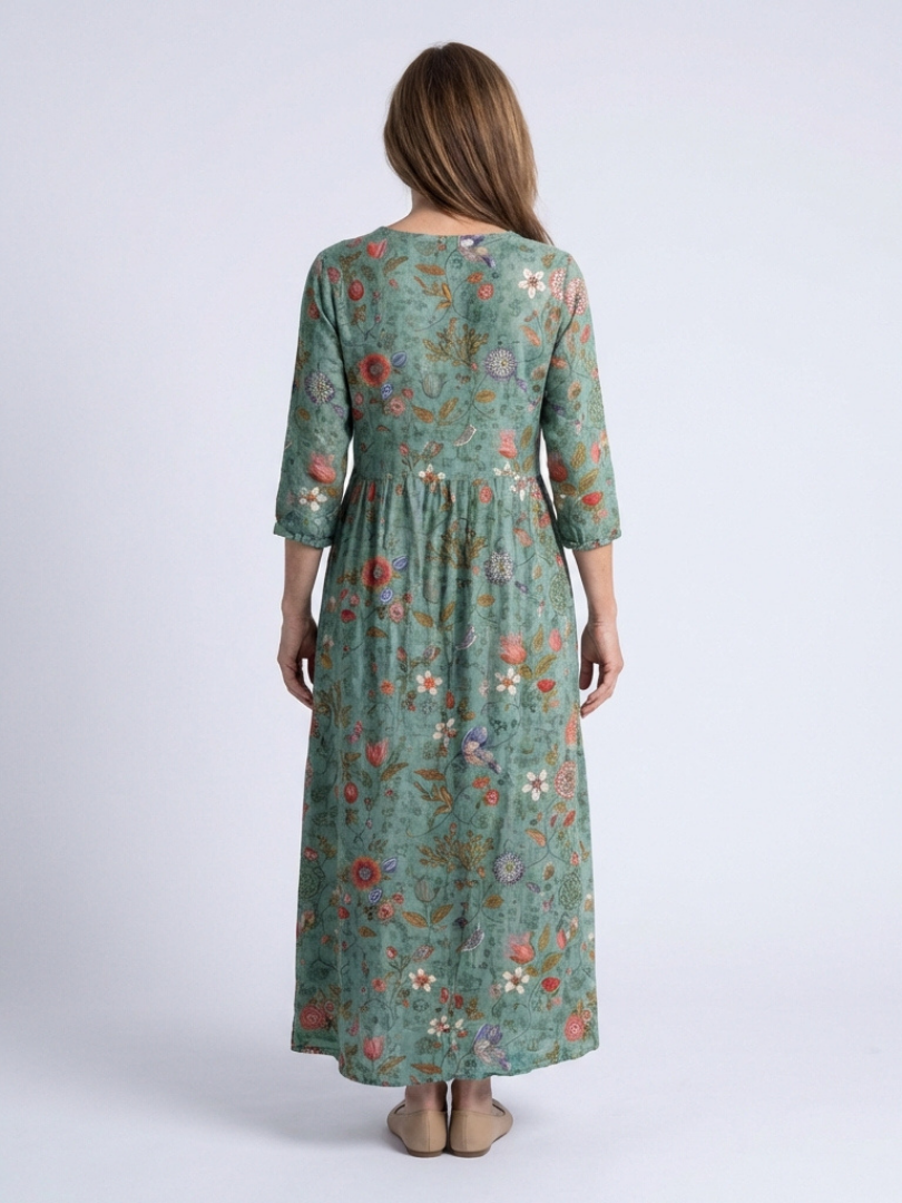 Floral v-neck maxi dress back view, teal-green with three-quarter sleeves