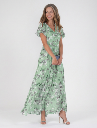 Green floral chiffon maxi dress with V-neck, short flutter sleeves, tiered skirt.