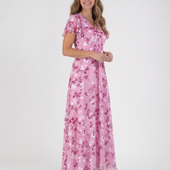 Pink floral chiffon maxi dress with V-neck and short sleeves, flowing tiered skirt.