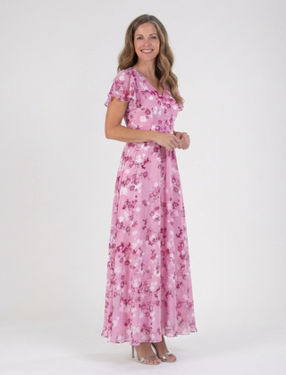 Pink floral chiffon maxi dress with V-neck and short sleeves, flowing tiered skirt.