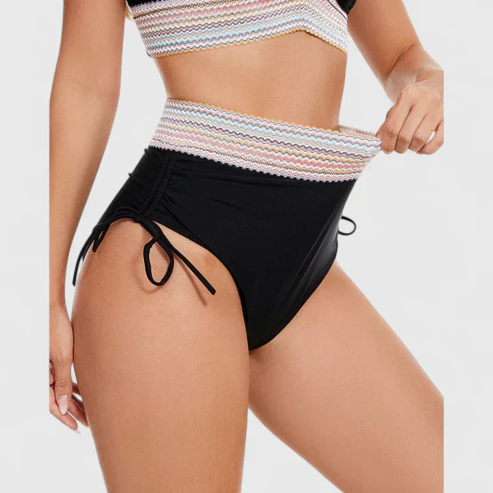 Black tie-side bikini bottoms with striped tummy band and ruching for coverage