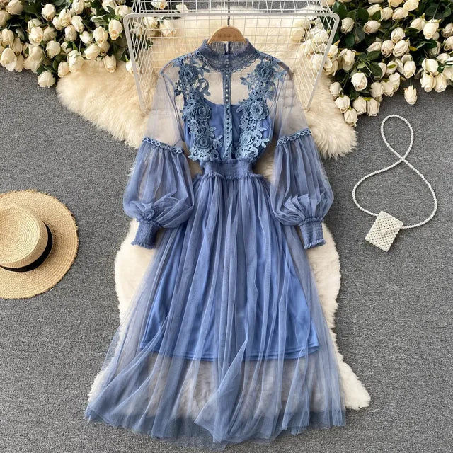 Light blue lace tulle long-sleeve dress with puff sleeves and tiered net skirt