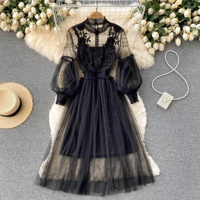Black lace and tulle long-sleeve dress with puff sleeves and gathered waist