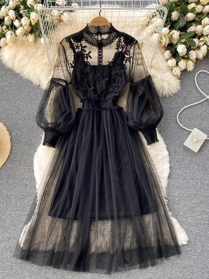 Black lace tulle long-sleeve dress with puff sleeves and tiered net skirt