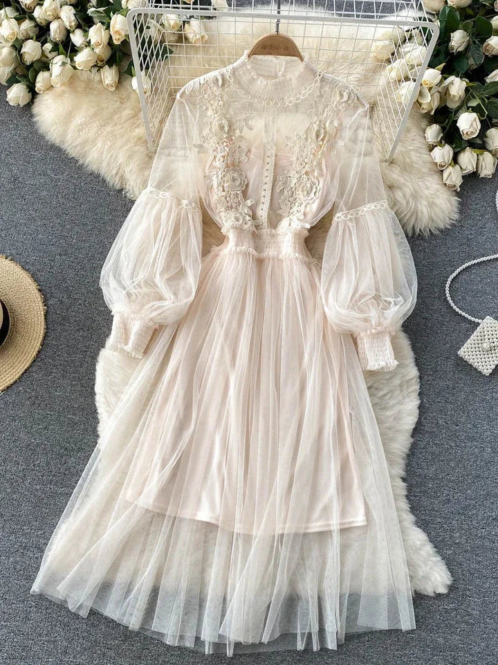 Cream/beige lace long-sleeve tulle dress with puff sleeves and layered hem