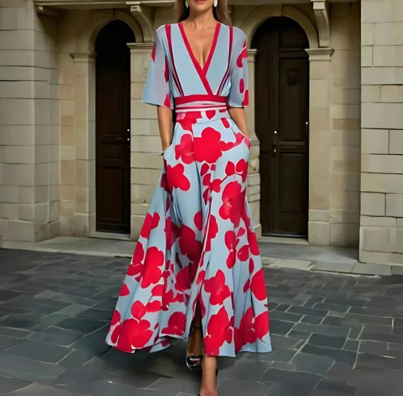 Floral midi dress with V-neck, short sleeves, red belt, light blue base and red blooms