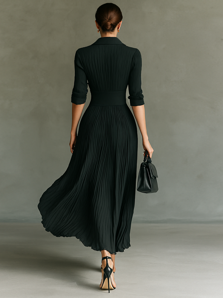 Pleated maxi dress, black back view with gathered pleats and 3/4 sleeves