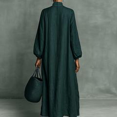 Back view teal maxi dress with high neck and loose A-line silhouette