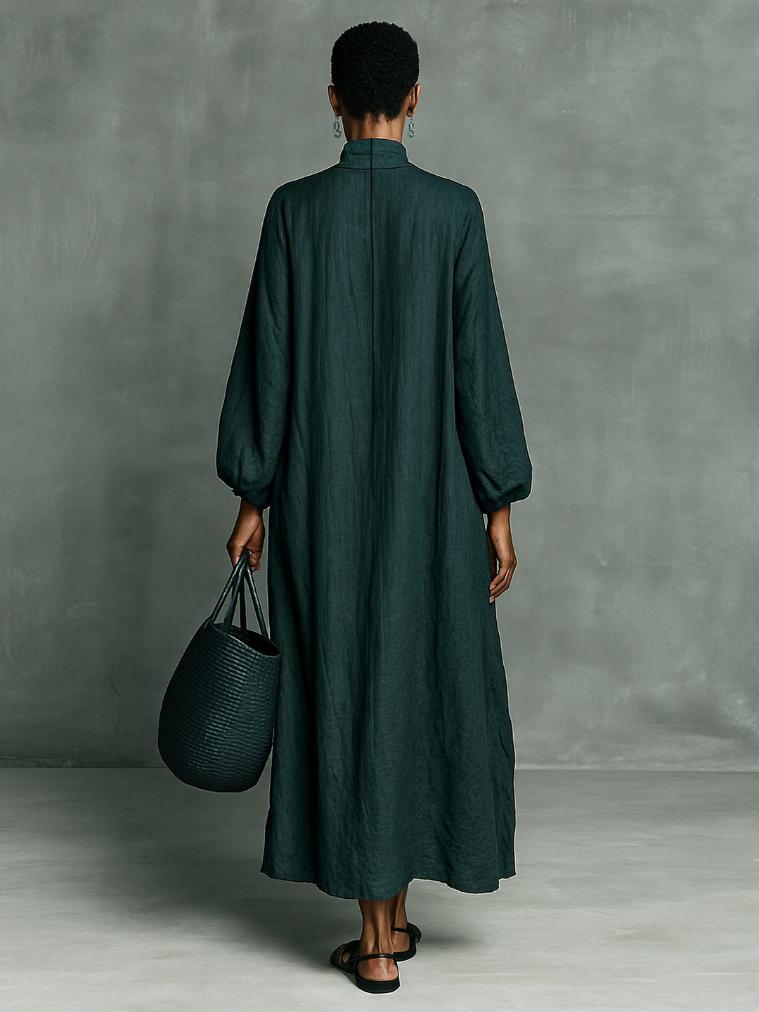 Back view teal maxi dress with high neck and loose A-line silhouette