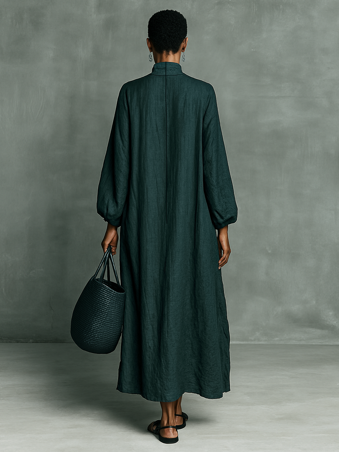 Back view teal maxi dress with high neck and loose A-line silhouette