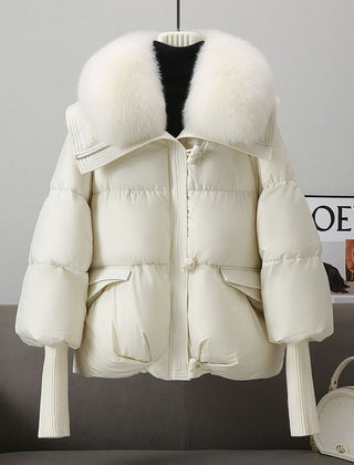 White puffer jacket with faux fur collar, front zipper, flap pockets, ribbed knit cuffs