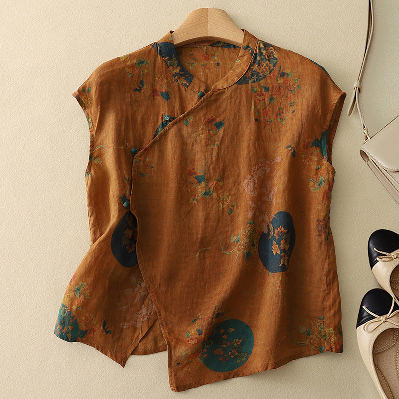 Brown sleeveless linen top with scattered colorful floral and leaf print