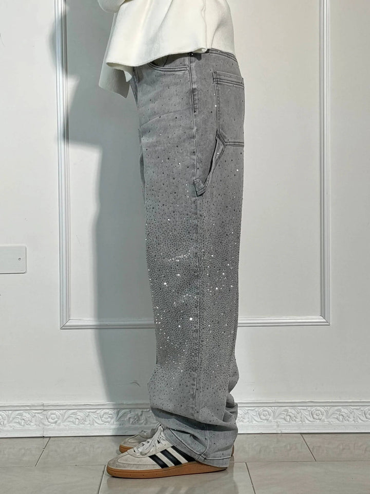 Gray speckled denim trousers with rear pocket detail and straight fit