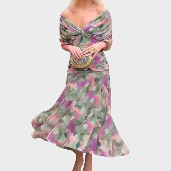 Off-shoulder floral midi dress in green, pink, and purple with twisted front and full skirt