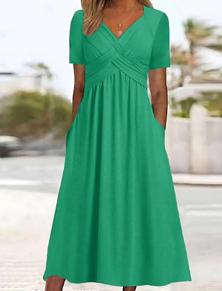 Green midi dress with V-neck, short sleeves, and ruched crossover waist