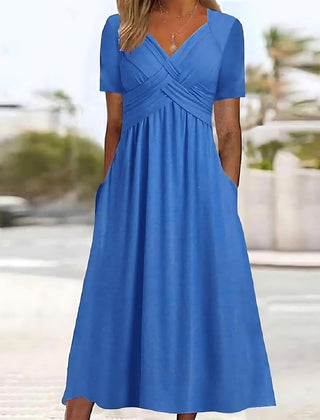 Blue midi dress with V-neck, short sleeves, and ruched crossover waist