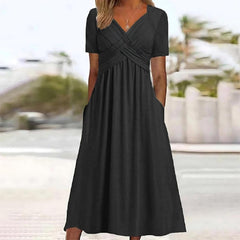 Black midi dress with V-neck, short sleeves, and ruched crossover waist