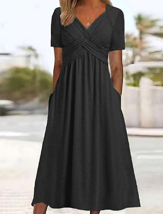 Black midi dress with V-neck, short sleeves, and ruched crossover waist