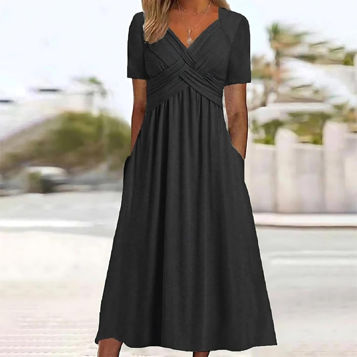 Black midi dress with V-neck, short sleeves, and ruched crossover waist