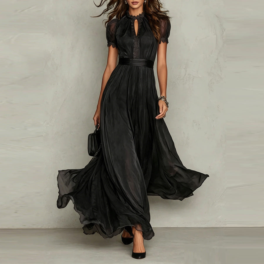 Black chiffon maxi dress with puff sleeves, keyhole neckline, pleated waist, flared skirt