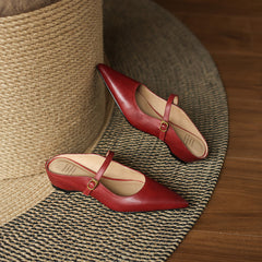 Maroon leather pointed mules with slingback strap and low block heel, pair view