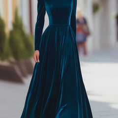 Blue velvet dress with high neck, long sleeves, fitted bodice, flared skirt