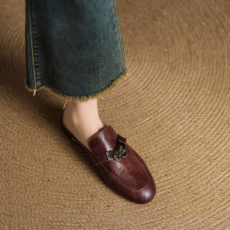 Maroon leather mule with buckle strap and rounded moc-toe style