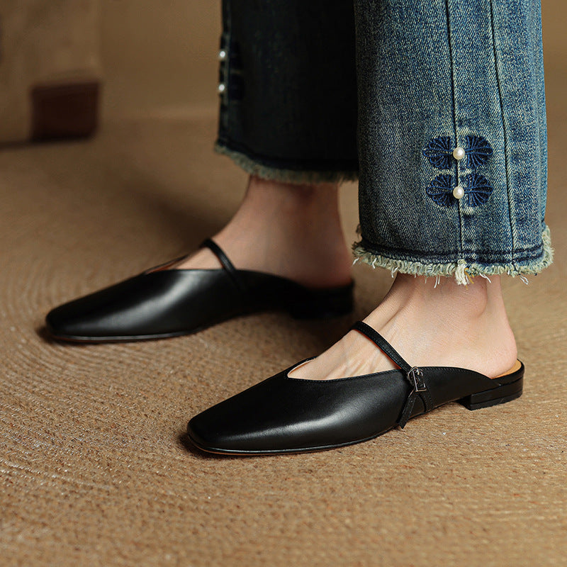 Miral genuine leather mules in black, pointed slip-on flats with thin sling strap