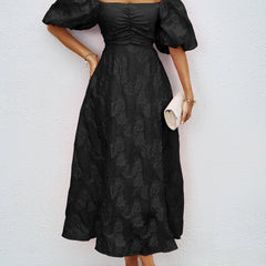 Black off-shoulder midi dress with short puff sleeves and textured ruched front