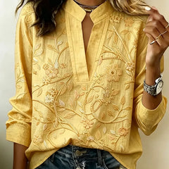 Yellow embroidered popover blouse with V-neck and 3/4 sleeves, vine floral embroidery
