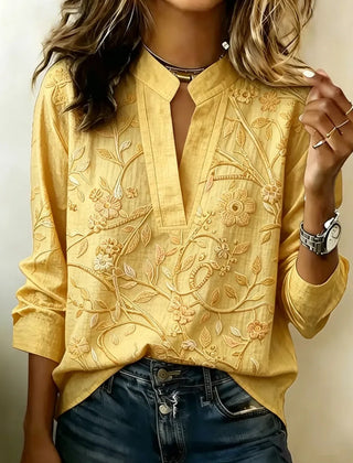 Yellow embroidered popover blouse with V-neck and 3/4 sleeves, vine floral embroidery