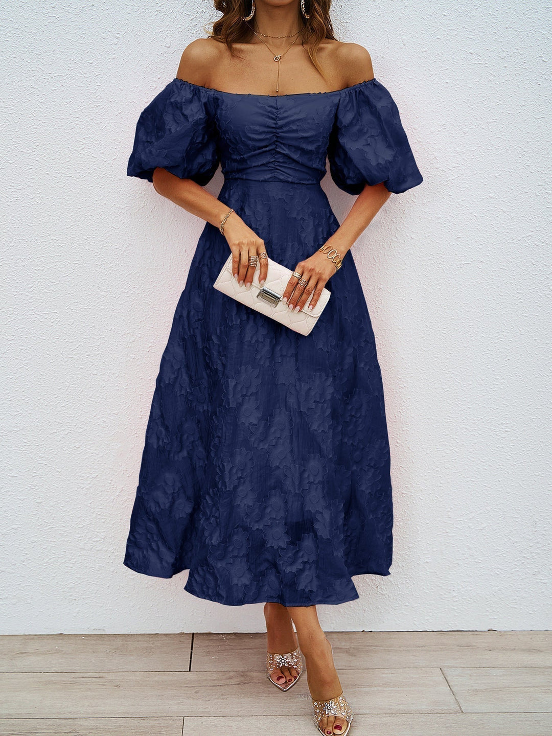 Blue off-shoulder midi dress with puff sleeves, ruched bodice, and full skirt