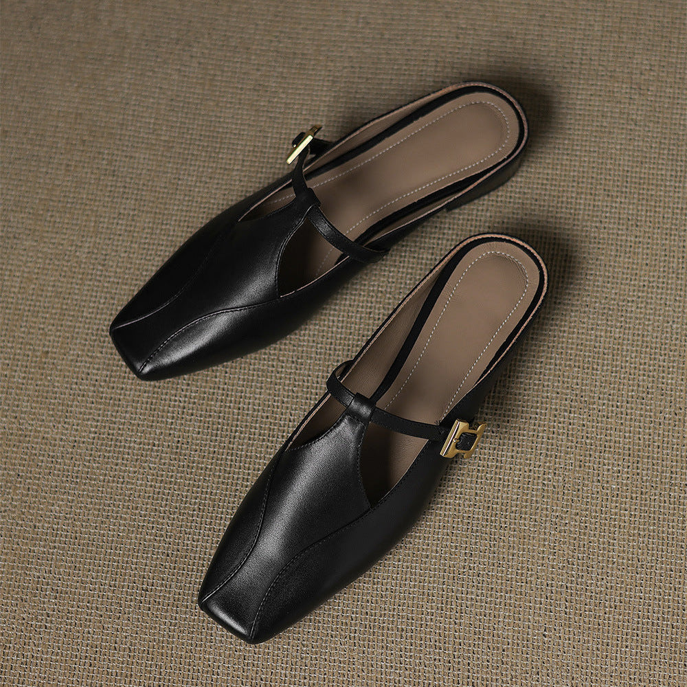 Black leather mules with slingback strap and gold-tone buckle hardware