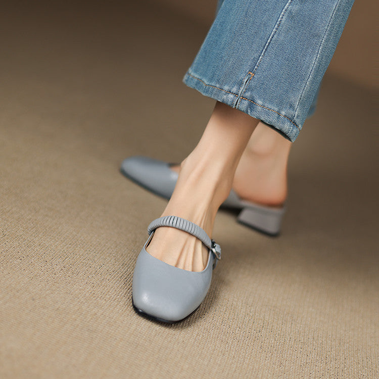 Light blue leather Mary Jane mule, showing elastic strap and low block heel