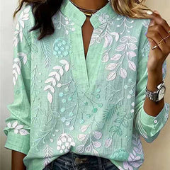 Sage green embroidered popover blouse with V-neck and 3/4 sleeves, vine and leaf embroidery