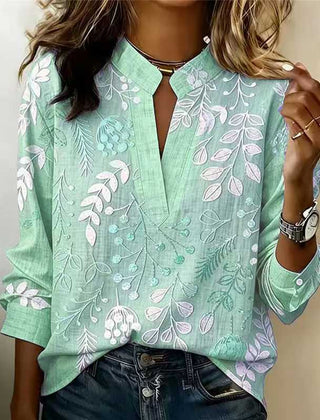 Sage green embroidered popover blouse with V-neck and 3/4 sleeves, vine and leaf embroidery