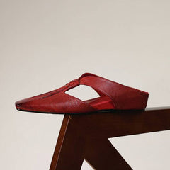 Red square-toe genuine leather mule with strap across the vamp and slip-on fit.