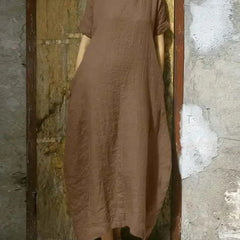 Brown casual maxi dress with short sleeves and round neckline, relaxed long length
