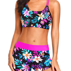 Floral tropical bikini set with black top and pink waistband swim shorts