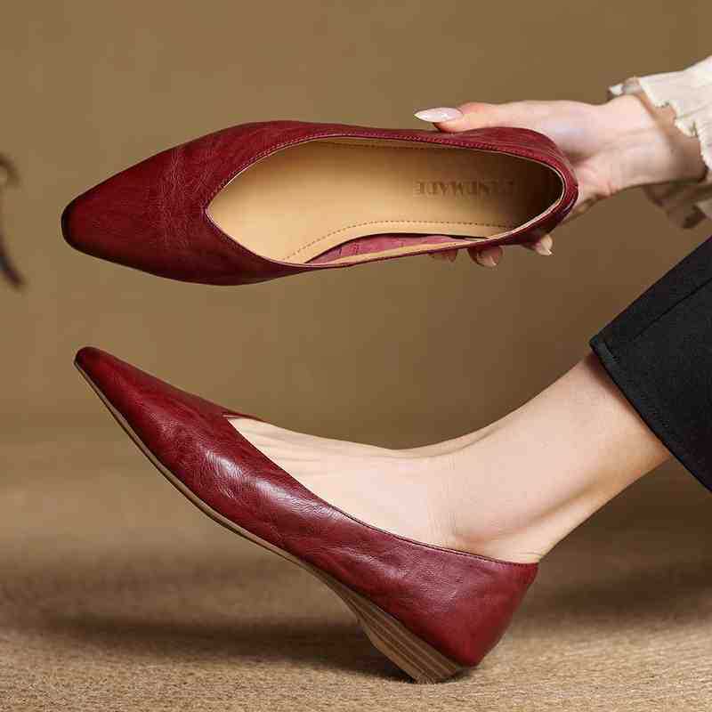 Maroon leather pointed-toe mule flats with open top and low stacked heel