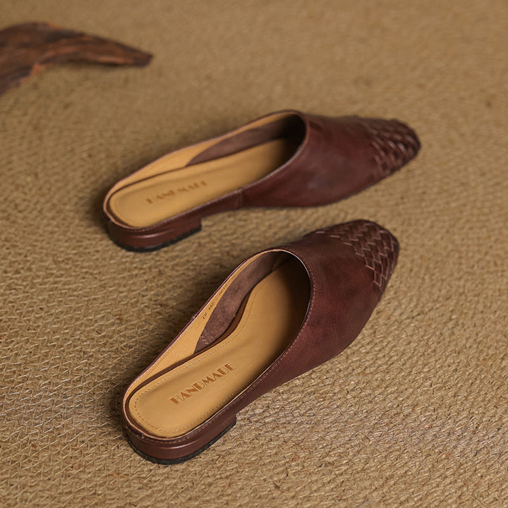 Burgundy genuine leather mules with woven toe panels and cushioned lining