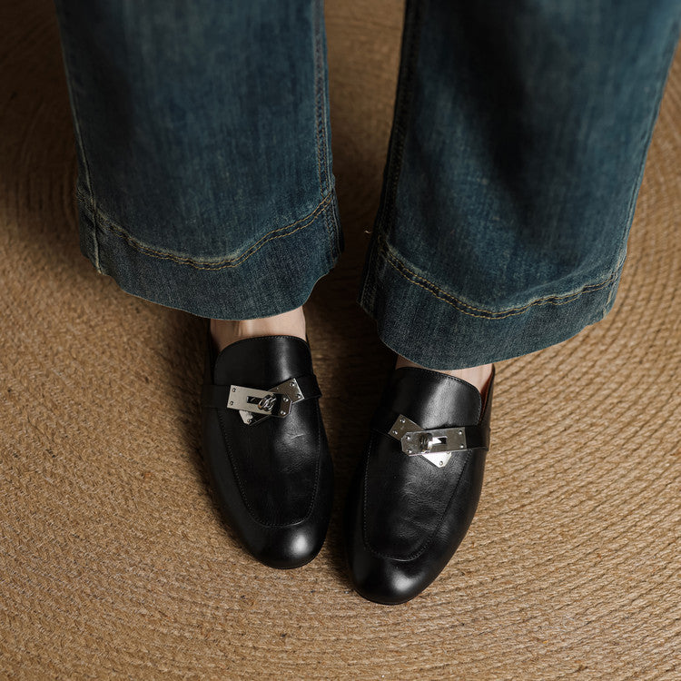 Black genuine leather mules with square toe and silver buckle strap detail