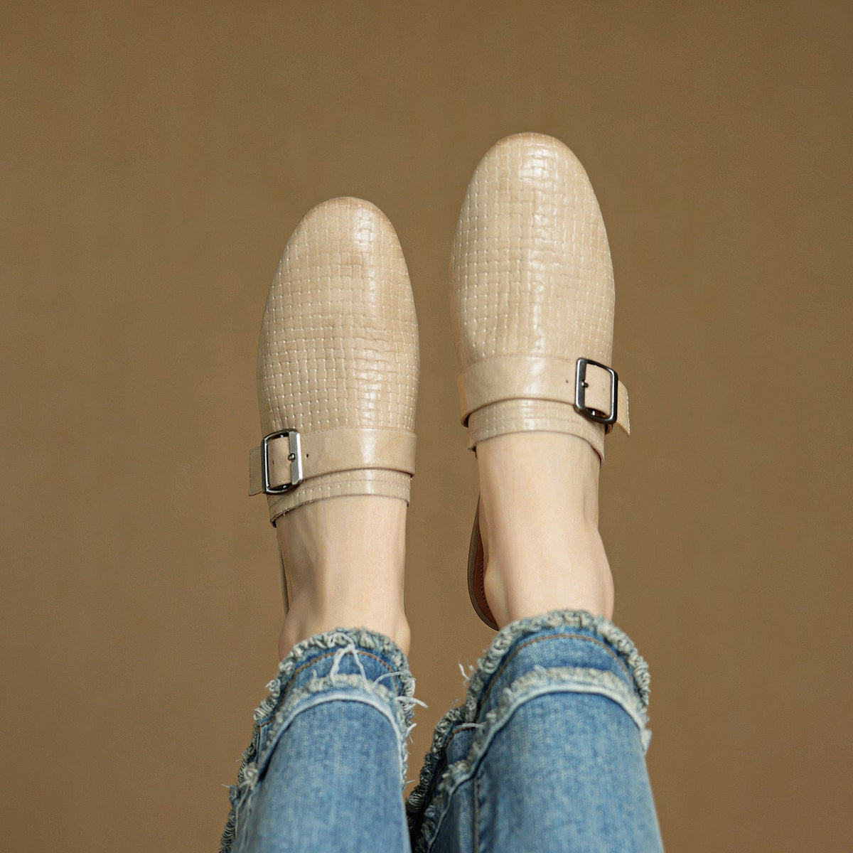 Beige leather mules, closed toe, square buckle strap